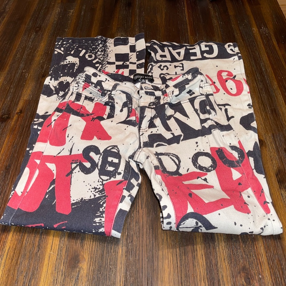 Newspaper type flare pants Dolls killl